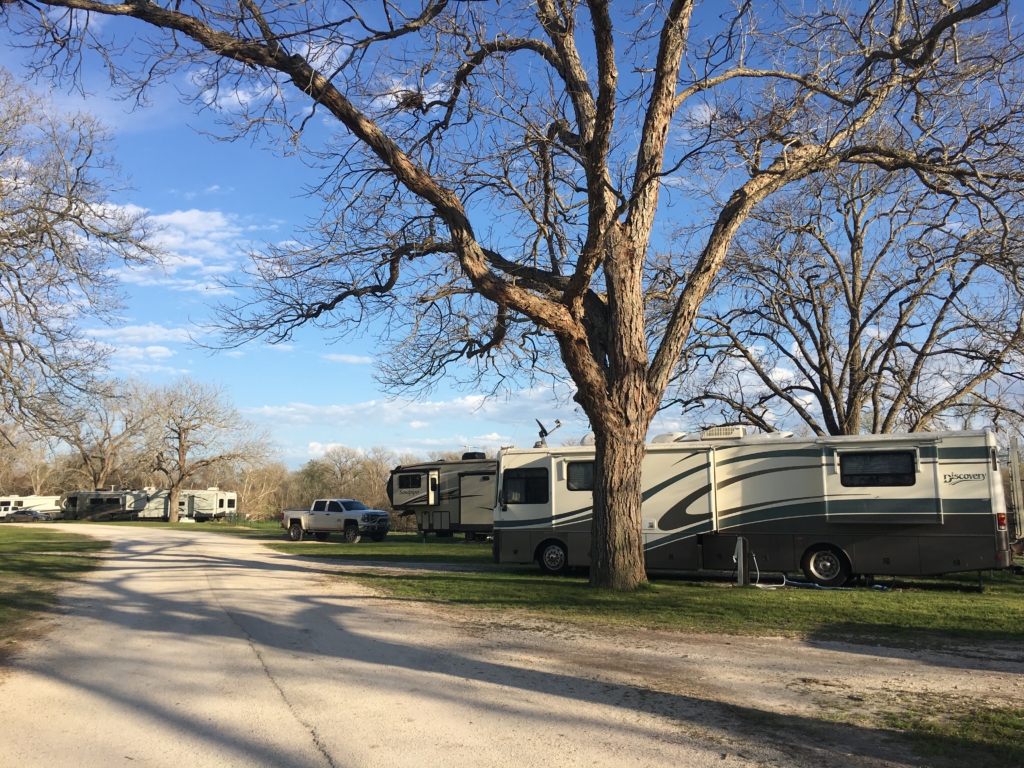View of road full of campsites at Thousand Trails in Columbus, Texas