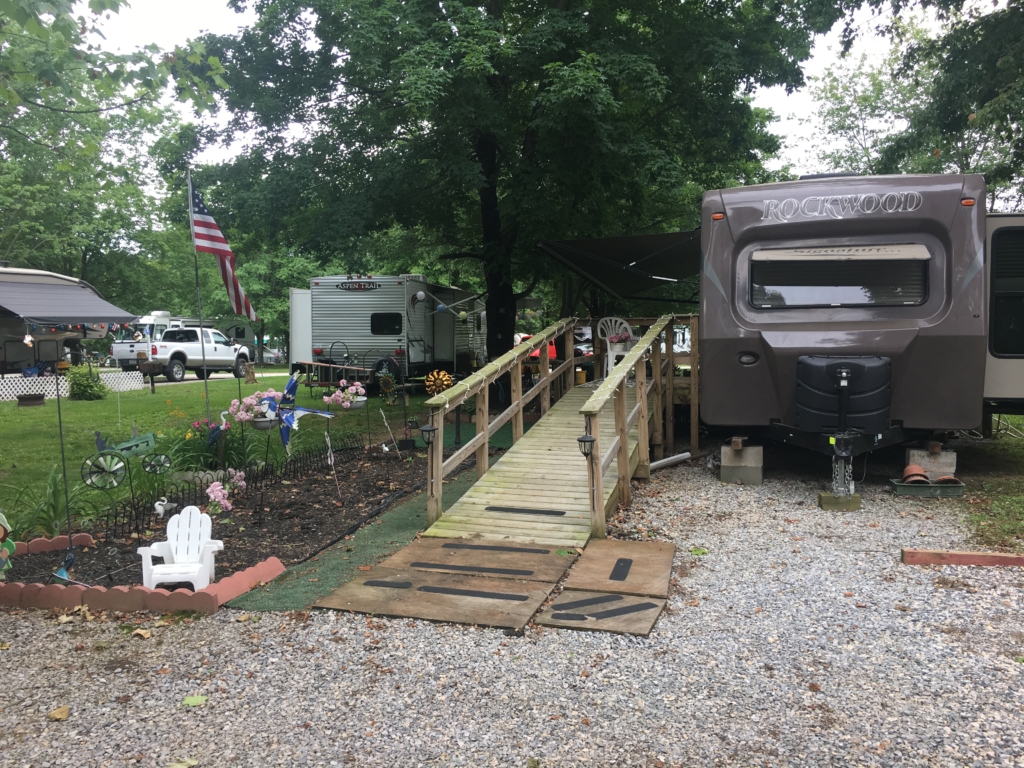 RV with ramp and landscaping